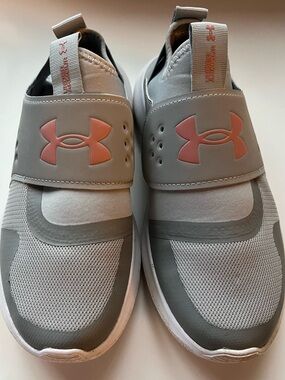 Under Armour Women’s Slip-On Sneakers in Light Gray with Pink Logo